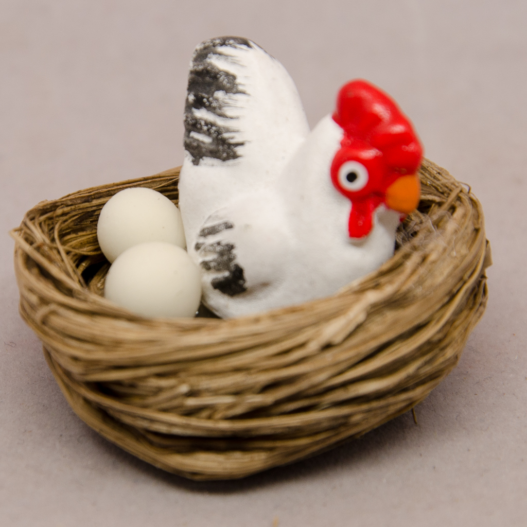 Nest mit Huhn und Eier